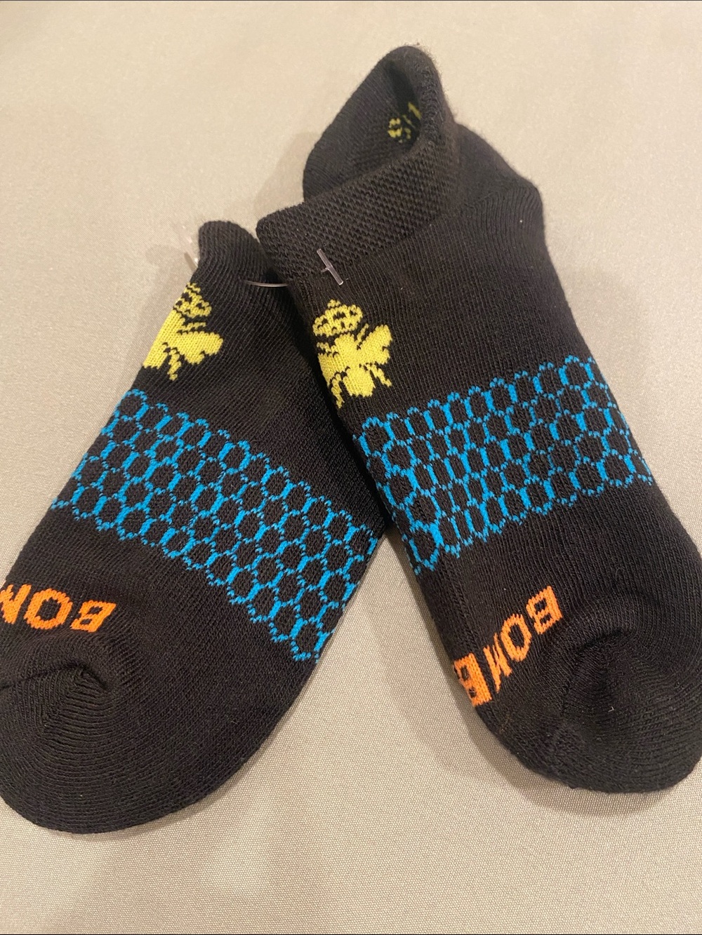 Bombas Black Low-Cut Socks with Blue and Orange Accents
